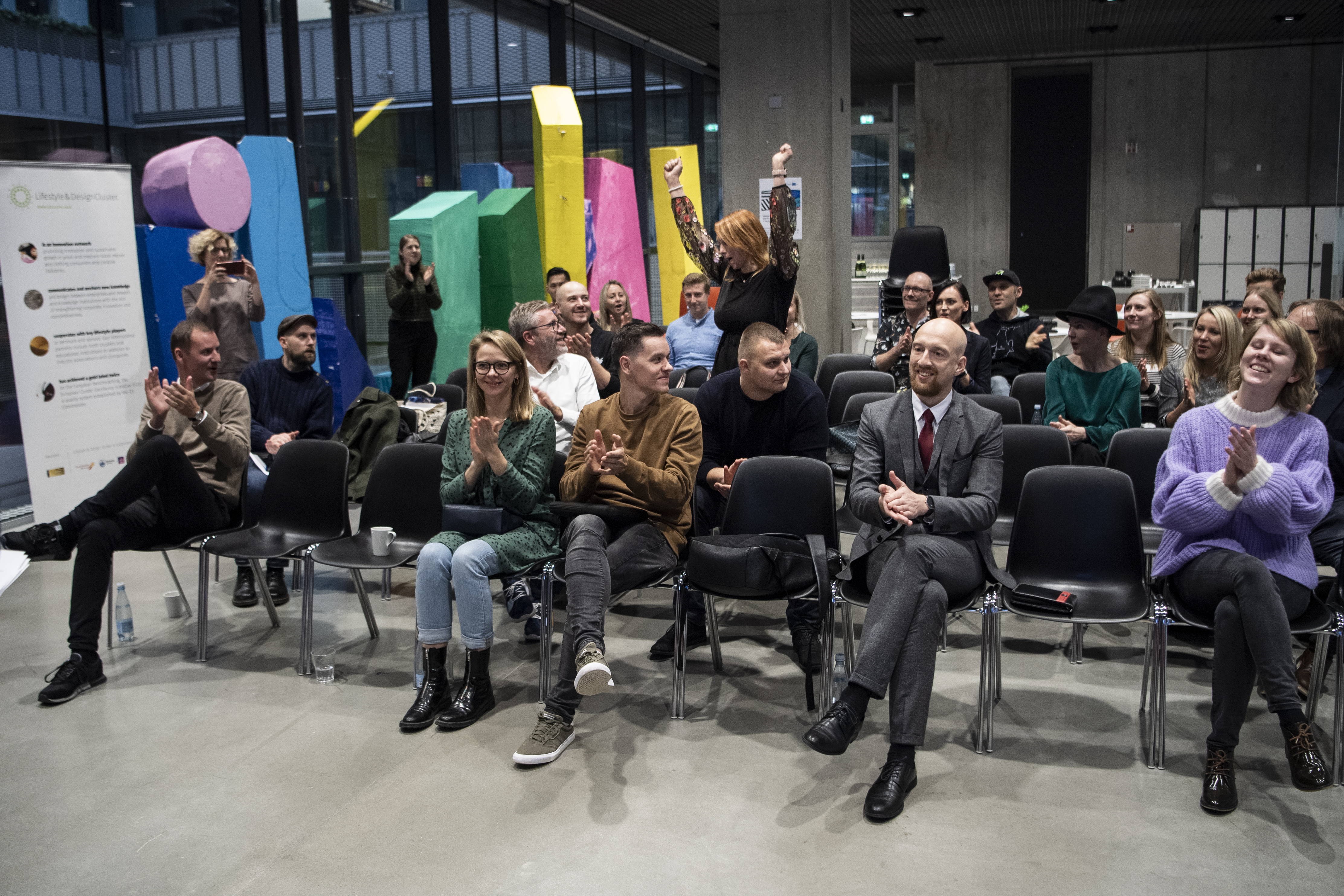 photo of people seated in an audience.